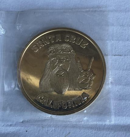 Souvenir coin hippie dude